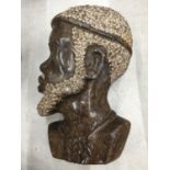 A TRIBAL ART BUST IN MARBLE EFFECT HEIGHT 18CM