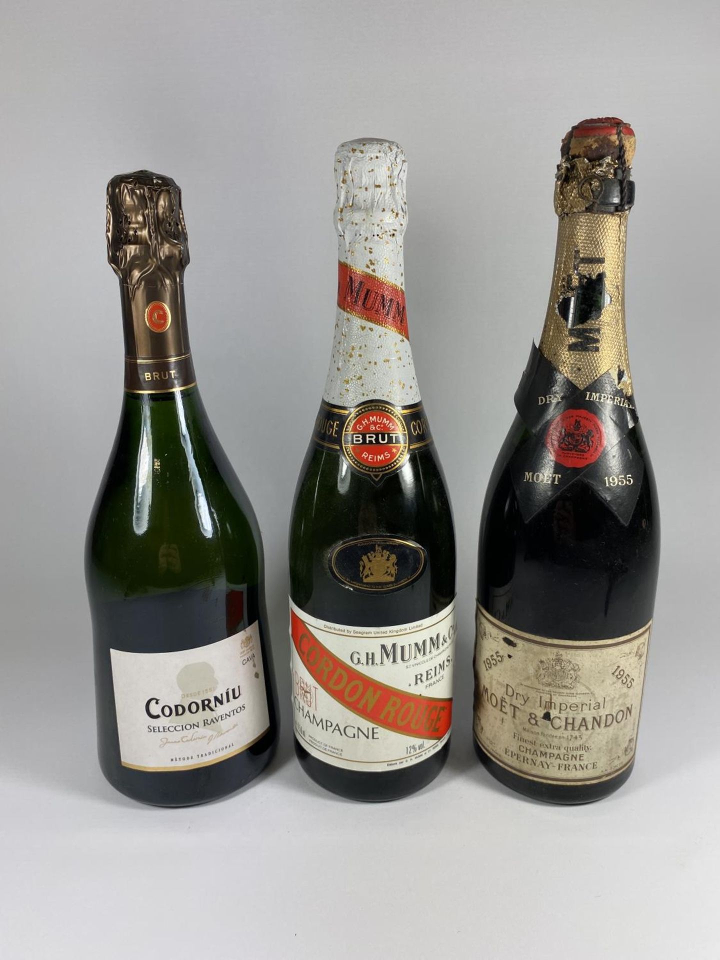 3 X 75CL BOTTLES - 1955 MOET & CHANDON DRY IMPERIAL, CODORNIU & MUMM & CO CHAMPAGNE