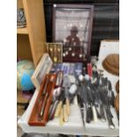 AN ASSORTMENT OF FLATWARE TO INCLUDE KNIVES, MEAT FORKS AND COLLECTORS SPPONS TO ALSO INCLUDE A