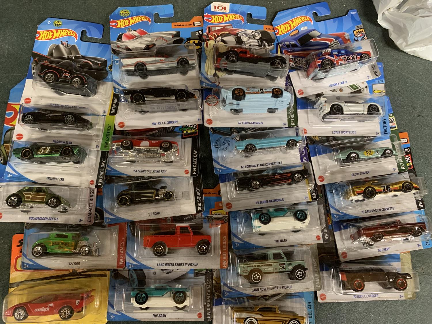 TWENTY FIVE VARIOUS CARDED HOT WHEELS CARS