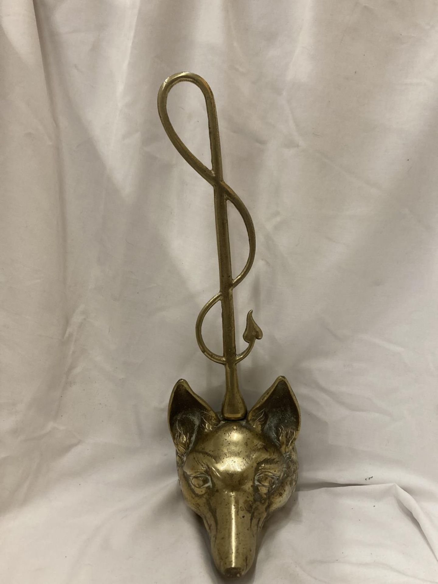 A VINTAGE BRASS FOX AND WHIP DOORSTOP HEIGHT 43CM