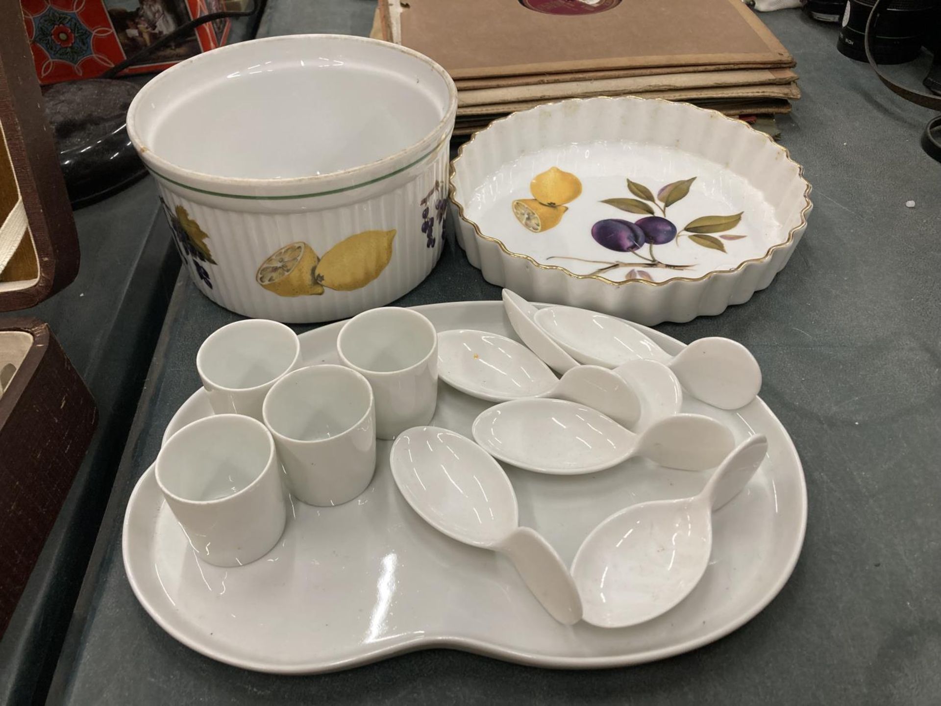 TWO PIECES OF ROYAL WORCESTER 'EVESHAM', PLUS A CERAMIC TRAY WITH EGG CUPS AND QUIRKY SPOONS