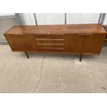 A RETRO TEAK SIDEBOARD BY A.H.MCINTOSH & CO LTD, ENCLOSING FOUR CUPBOARDS AND FOUR DRAWERS, 7' WIDE