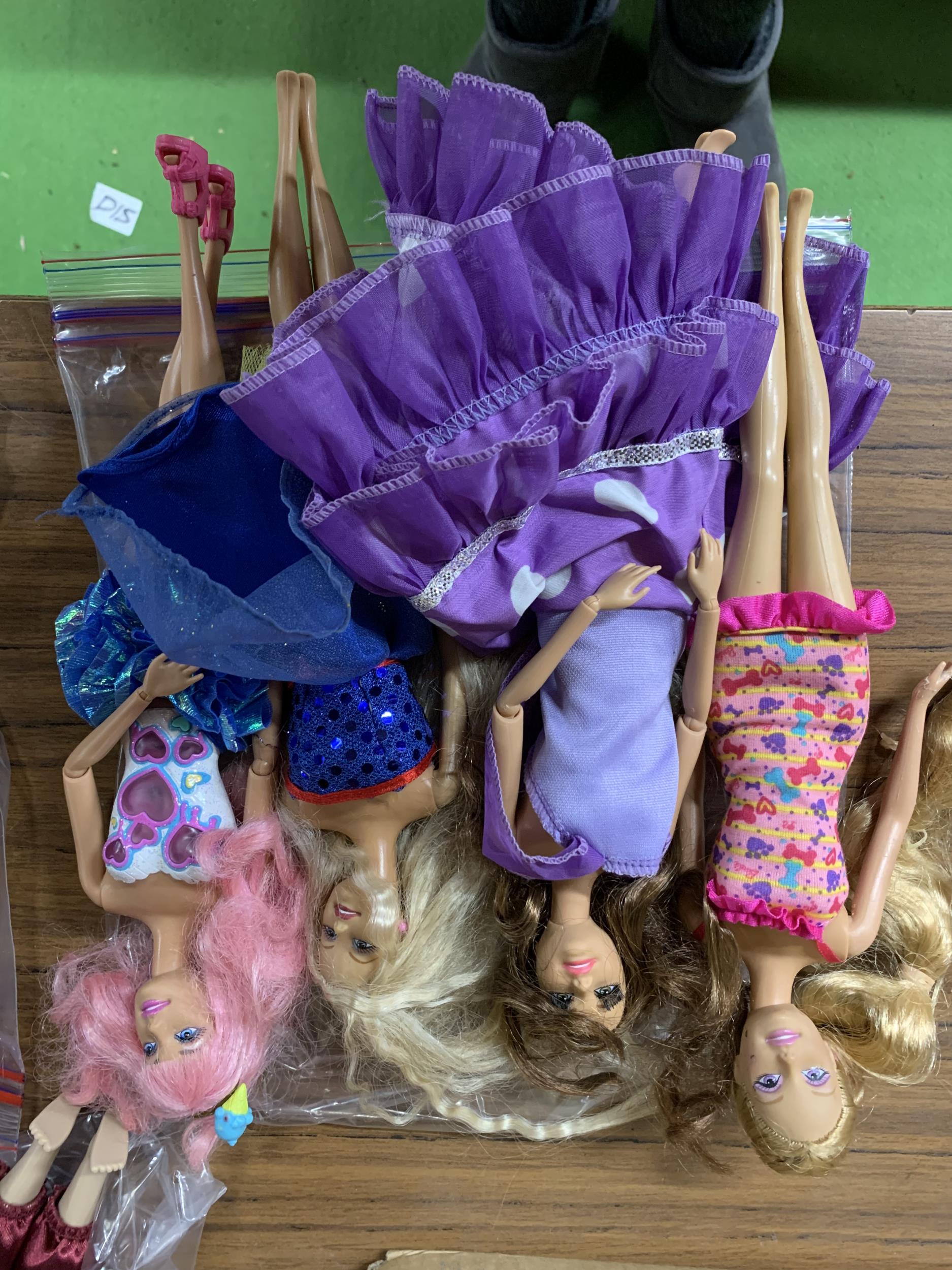 A BAG OF FOUR MATTEL DOLL FIGURES