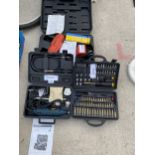 AN ASSORTMENT OF TOOLS TO INCLUDE A DRILL BIT SET, A NAIL GUN AND A DREMMEL DRILL ETC