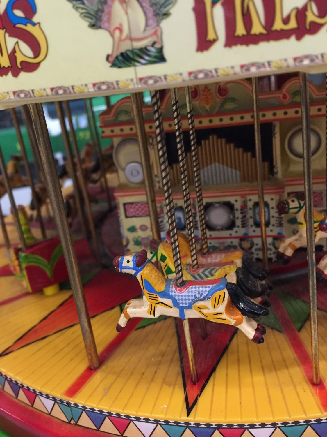 AN ELECTRIC MODEL CIRCUS MERRY GO ROUND - Image 4 of 4
