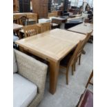 A MODERN OAK EXTENDING DINING TABLE, 55X35.5" (LEAF 15.5") AND FOUR CHAIRS, BY JOHN LEWIS