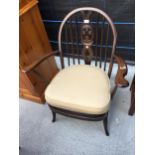 A VINTAGE ERCOL FLEUR DE LIS WINDSOR ARMCHAIR