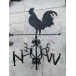 A LARGE WROUGHT IRON WEATHER VANE WITH COCKEREL TOP