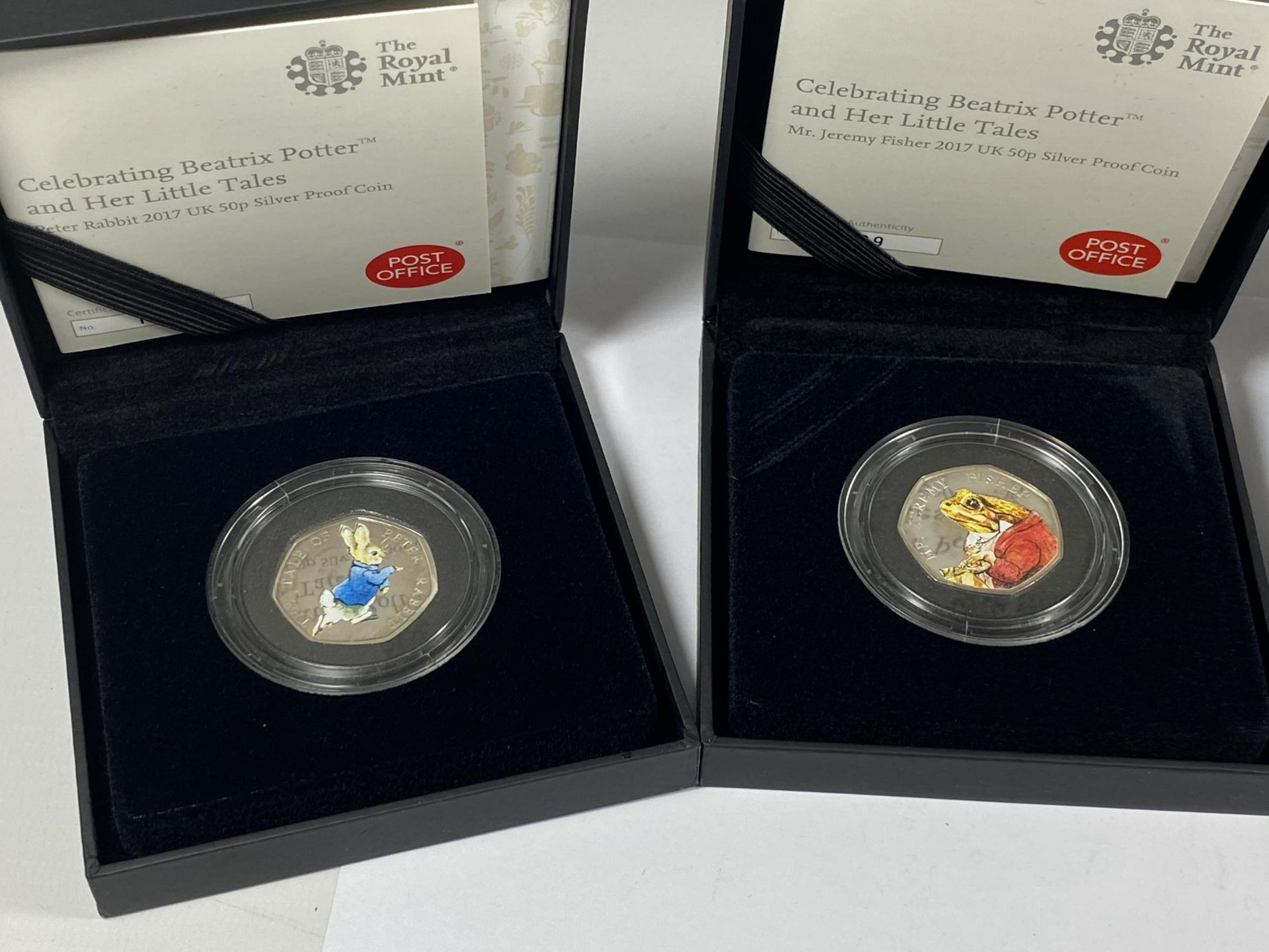 A SET OF FOUR BOXED ROYAL MINT BEATRIX POTTER SILVER 50P PROOF COINS - Bild 2 aus 3