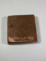 A HEAVY COPPER VINTAGE DESK PAPERWEIGHT