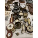 A LARGE QUANTITY OF BRASS ITEMS TO INCLUDE CLOCKS, BAROMETERS, FLATWARE, A TEASET, TANKARD, ETC
