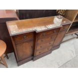 A MAHOGANY BREAKFRONT SIDEBOARD WITH FOUR CETRE DRAWERS, TOW FURTHER DRAWERS AND TWO DOORS