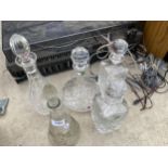 FIVE VARIOUS CUT GLASS DECANTORS