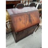 A REPRODUCTION MAHOGANY BUREAU, 30" WIDE