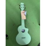 A DONNER GREEN UKELELE - AS NEW IN CASE