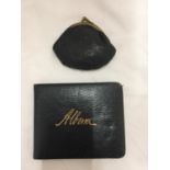 A VINTAGE AUTOGRAPH ALBUM AND A PURSE CONTAINING A QUANTITY OF VINTAGE FOREIGN COINS