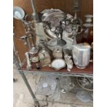 A LARGE ASSORTMENT OF METAL WARE ITEMS TO INCLUDE A PICQUOT WARE TEAPOT, CANDKLE STICKS AND A