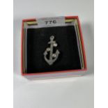 A BOXED HALLMARKED SILVER ANCHOR BROOCH