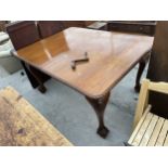 A VICTORIAN MAHOGANY WIND-OUT DINING TABLE ON CABRIOLE LEGS, WITH BALL AND CLAW FEET AND ROPE