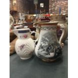 TWO VINTAGE JUGS, ONE TRANSFER PATTERNED 'THE OLD PATRIOTIC JUG' PLUS A COPY OT 'THE CAUGHLEY MASK-
