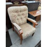 A 'YEOMAN UPHOLSTERY' FIRESIDE CHAIR