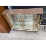 A 1960'S DISPLAY CABINET WITH SLIDING GLASS DOORS AND FLORAL DECORATION, 48" WIDE
