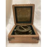 A BOXED BRASS SUNDIAL COMPASS - J H STEWARD, LONDON