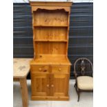 A MODERN PINE DRESSER WITH PLATE RACK, 33" WIDE