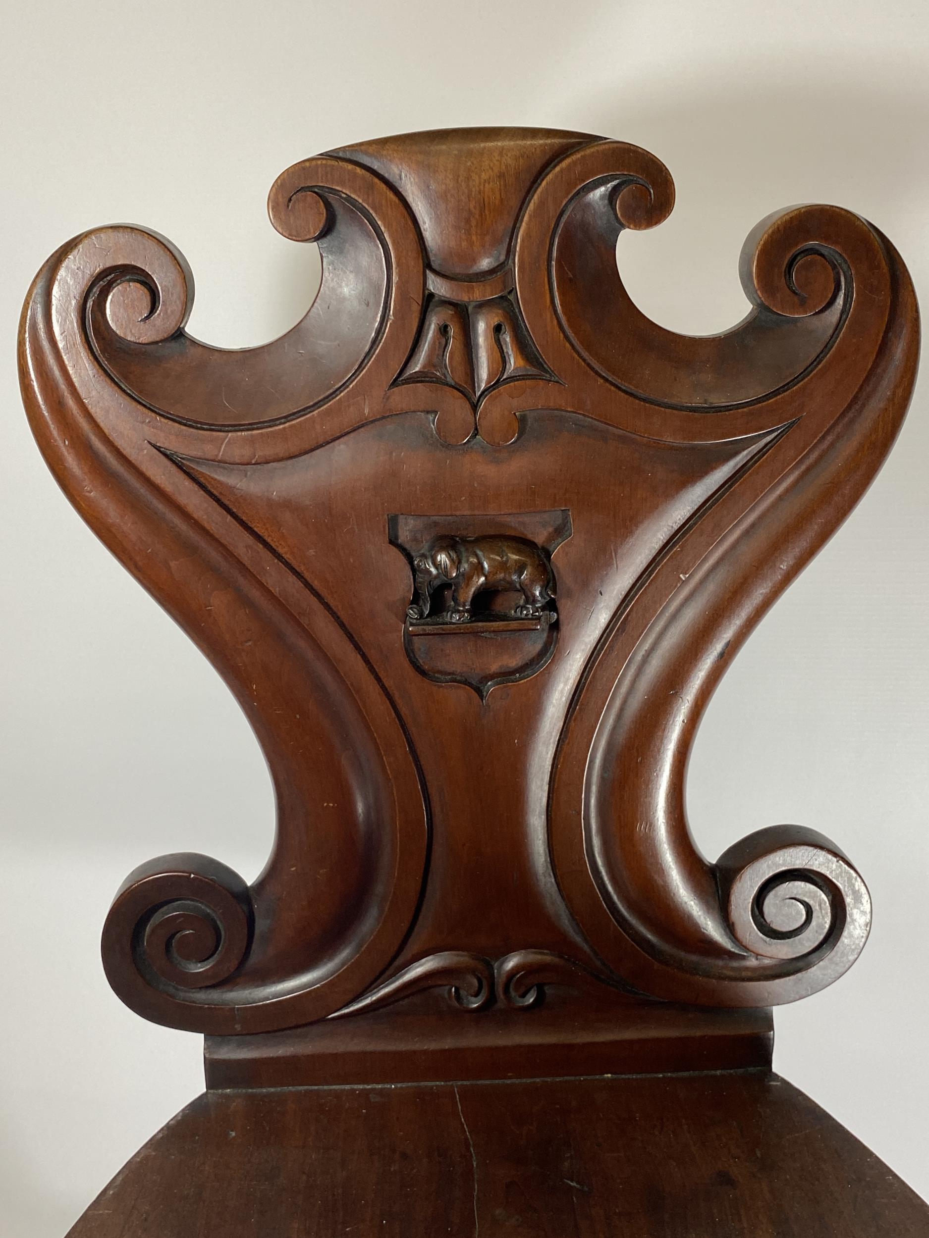 A 19TH CENTURY MAHOGANY CARVED BEDROOM CHAIR WITH ELEPHANT DESIGN BACK - Image 2 of 4