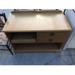 A 'CURTIS FURNITURE MAKERS' OAK VENEERED CHEST ENCLOSING PULL-OUT SLIDE, 44" WIDE
