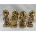 A SET OF FOUR GOLD COLOURED CERAMIC 'ROBERTSONS' BAND MEMBERS