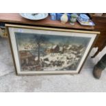 A LARGE GILT FRAMED PRINT OF A VILLAGE SCENE