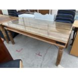 AN INDIAN HARDWOOD KITCHEN TABLE WITH METAL STRAPS, 70X35"