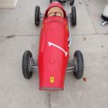 A METAL MODEL OF A 1950s FERRARI RACING CAR - APPROX 6 FT LONG