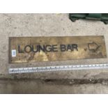 A BRASS 'LOUNGE BAR' SIGN (L:60CM)