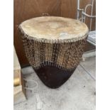 A LARGE TRIBAL BONGO DRUM