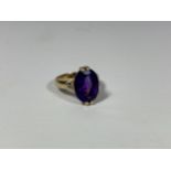 A AMETHYST AND 9CT YELLOW GOLD RING WITH APPROX 0.05 DIAMOND SHOULDERS, SIZE M, WEIGHT 5.7G