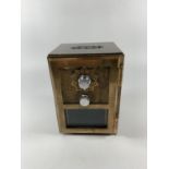 A VINTAGE BRASS AND WOOD 'SAFE' MONEY BOX HEIGHT 12.5CM