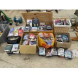 A LARGE QUANTITY OF DVDS AND BOOKS ETC