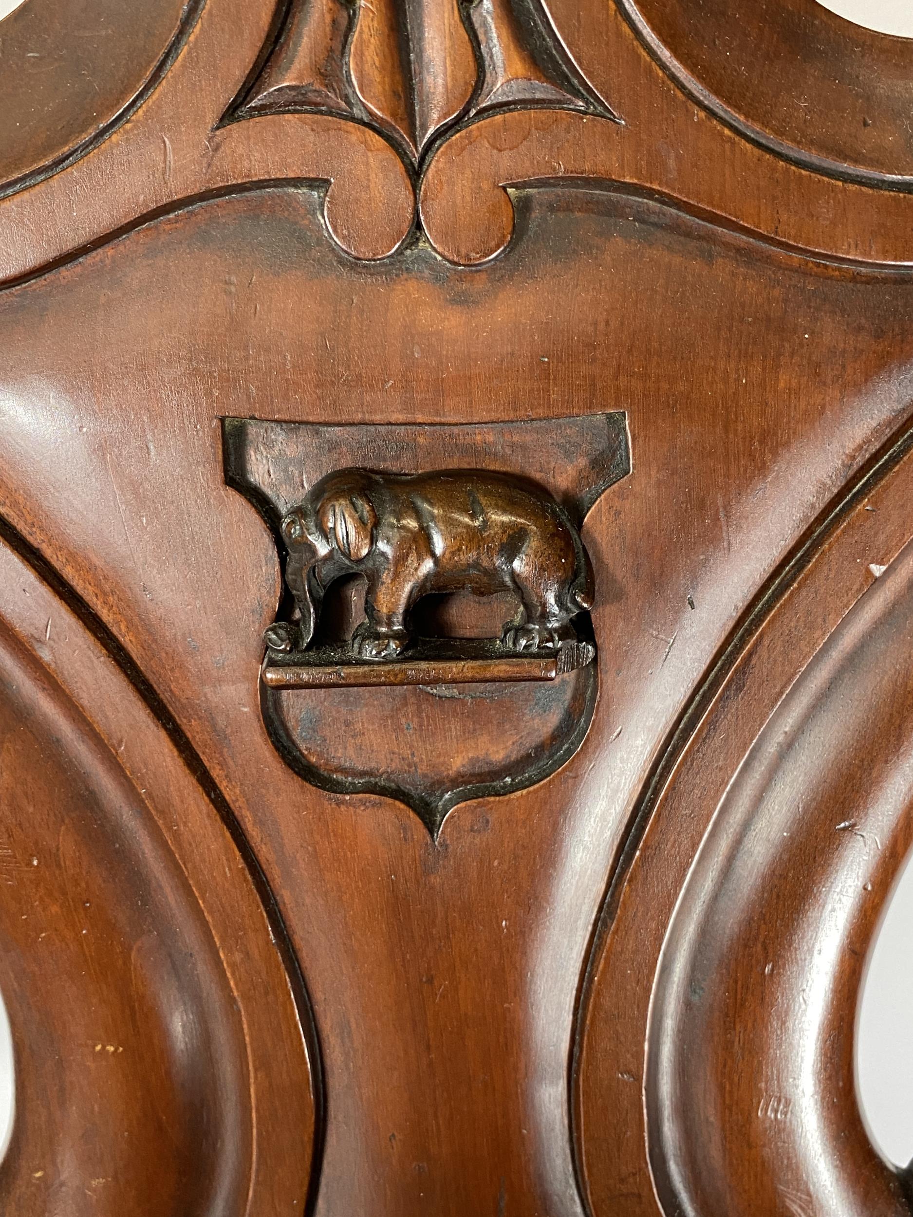 A 19TH CENTURY MAHOGANY CARVED BEDROOM CHAIR WITH ELEPHANT DESIGN BACK - Image 3 of 4