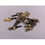 A SET OF VINTAGE POCKET WATCH KEYS