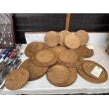 A LARGE QUANTITY OF CIRCULAR WOODEN PLACE MATS