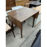 A MODERN OAK EFFECT DROP-LEAF KITCHEN TABLE