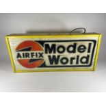 AN ILLUMINATED "AIRFIX MODEL WORLD" SIGN (LENGTH 61CM, HEIGHT 28CM, DEPTH 10CM)