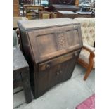 A SMALL OAK MID 20TH CENTURY BUREAU, 30" WIDE