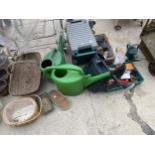 AN ASSORTMENT OF GARDEN ITEMS TO INCLUDE A WOODEN TRUG, WATERING CANS AND A RASP ETC