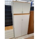 A MODERN TWO DOOR WARDROBE WITH TOP BOX