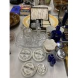 A QUANTITY OF ITEMS TO INCLUDE POT LIDS, BOXED FLATWARE, VINTAGE BLUE BOTTLES, GLASS DRESSISNG TABLE