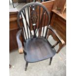 A REPRODUCTION WHEEL BACK WINDSOR ELBOW CHAIR